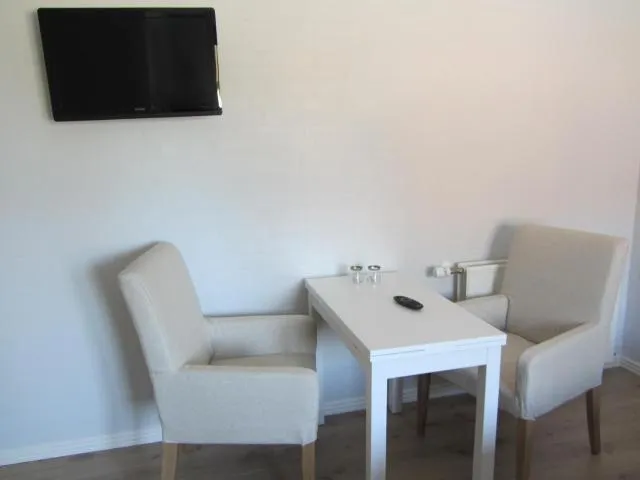  Vestervang Bed & Breakfast - picture  : Seating area,TV/entertainment centre,Dining area,Property 