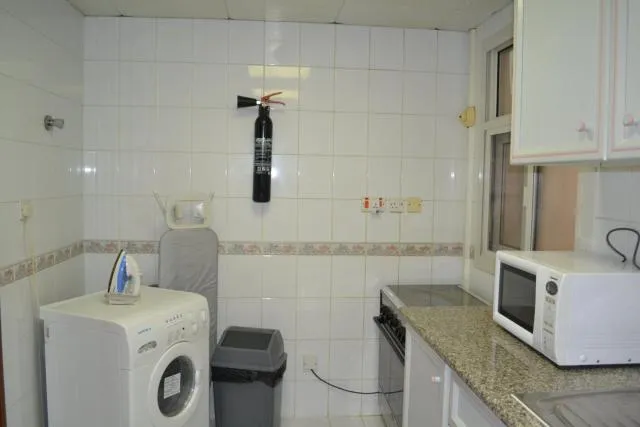  Abu Dhabi Plaza Hotel Apartments - picture  : Kitchen/kitchenette,Bathroom,Kitchen or kitchenette,Property 