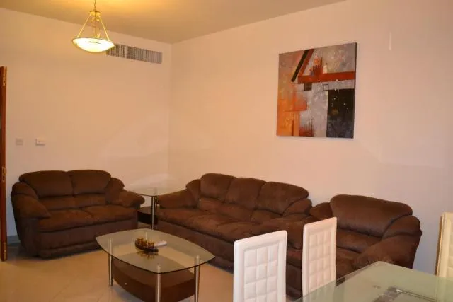  Abu Dhabi Plaza Hotel Apartments - picture  : Seating area,Living room,Property 