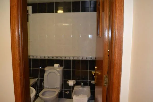  Abu Dhabi Plaza Hotel Apartments - picture  : Kitchen/kitchenette,Bathroom,Bathroom,Property 