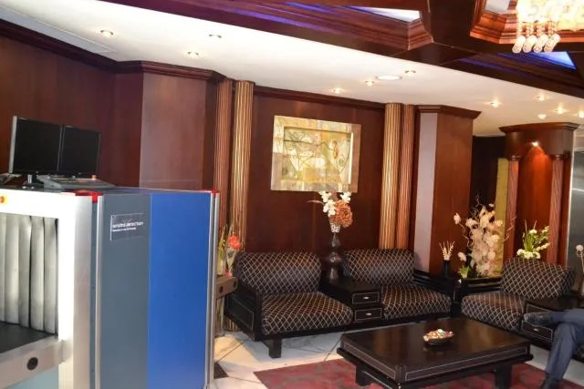  Abu Dhabi Plaza Hotel Apartments - picture  : Nearby landmark,Seating area,Living room,Property 