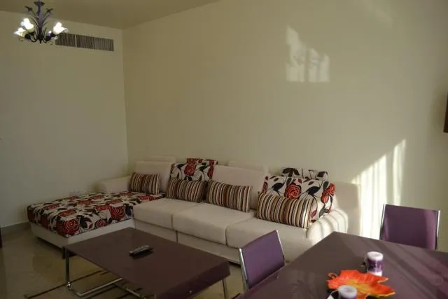  Abu Dhabi Plaza Hotel Apartments - picture  : Seating area,Living room,Property 