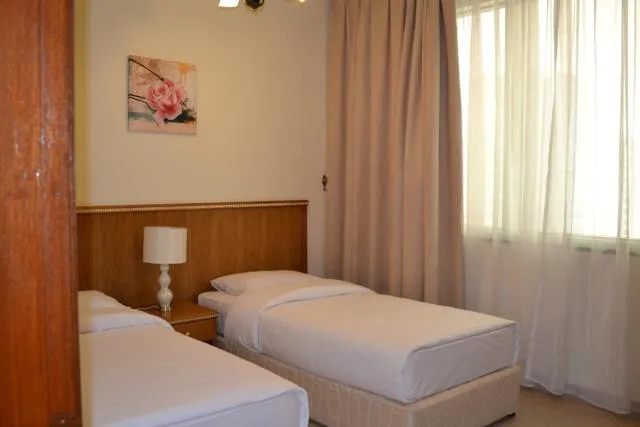  Abu Dhabi Plaza Hotel Apartments - picture  : Bed,Photo of the whole room,Room 