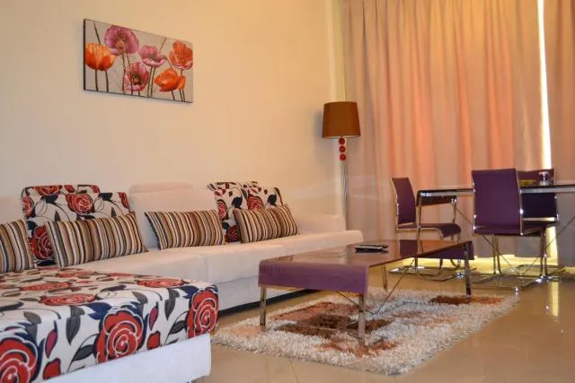  Abu Dhabi Plaza Hotel Apartments - picture  : Seating area,Living room,Property 
