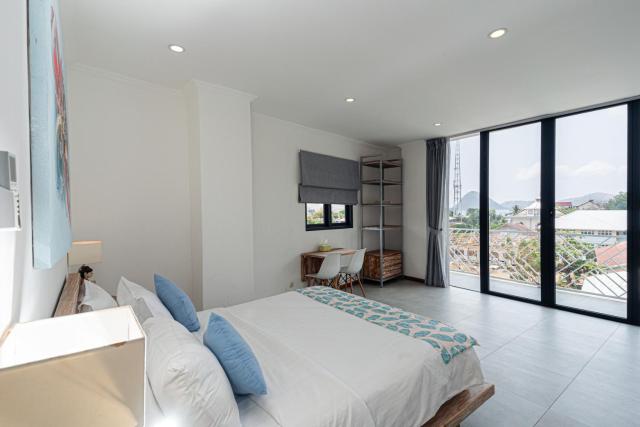 Komodo Suites Downtown — photo 23