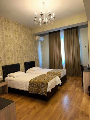 Standard Quadruple Room — Hotel Diamond