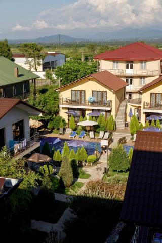 Quadruple Room with Balcony — Hotel Chero