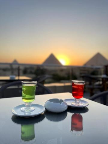 AKHNATON Pyramids View Hotel With Rooftop Access & free airport pickup — photo 13