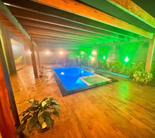 King Suite with Pool View — Pousada Toa Toa Lavras Novas