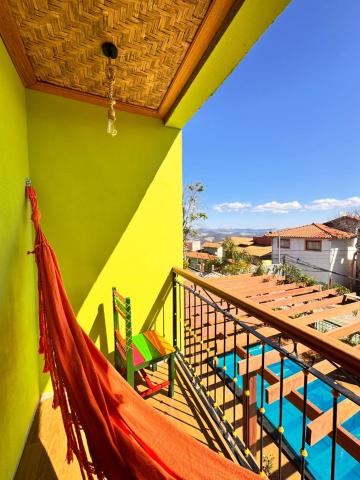 King Suite with Pool View — Pousada Toa Toa Lavras Novas