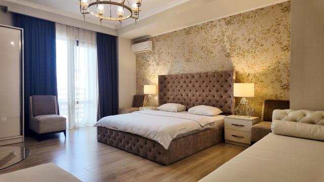 Deluxe Double Room with Balcony — Rivendell Boutique By Umbrella