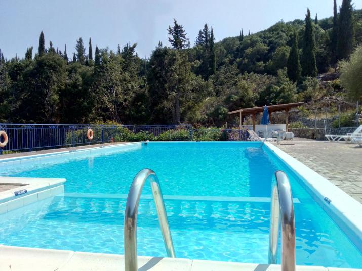KAMINAKIA Apartments - Adults only policy - Delve into this little oasis where peace and quiet reign supreme - Sheltered by an evergreen cypress forest - Offering a large swimming pool exclusively for guests' use and breathtaking sea views from every room