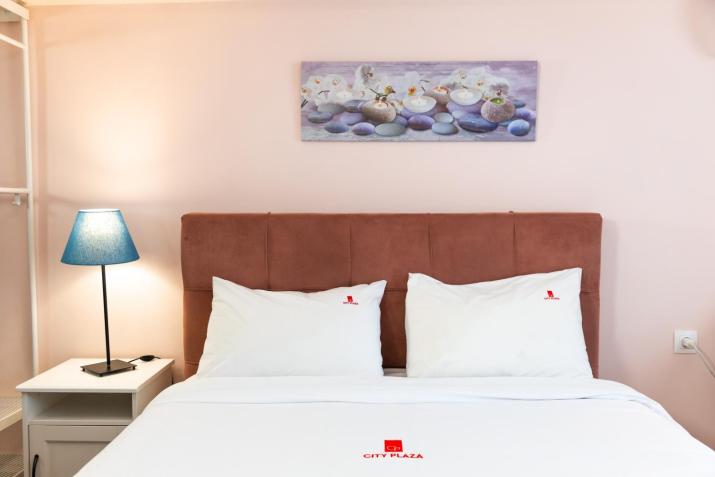 City Plaza Apartments & Rooms