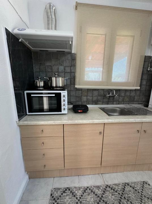 So Simple Guest House,Mouresi