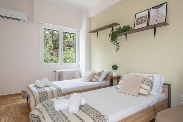 Athens Oasis with enchanting green hill views