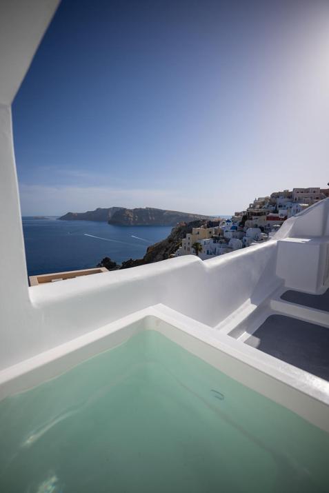 Three Domes Oia - an Iconic Collection
