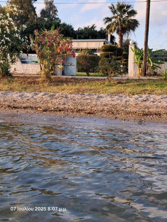Top floor on villa, 3' from center, by the sea! Host is Efi Kwsta