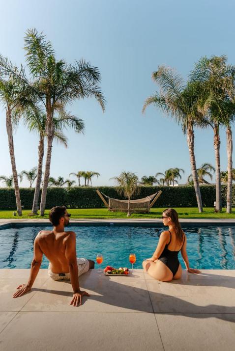 TAF Villas Beach Resort with Tesla