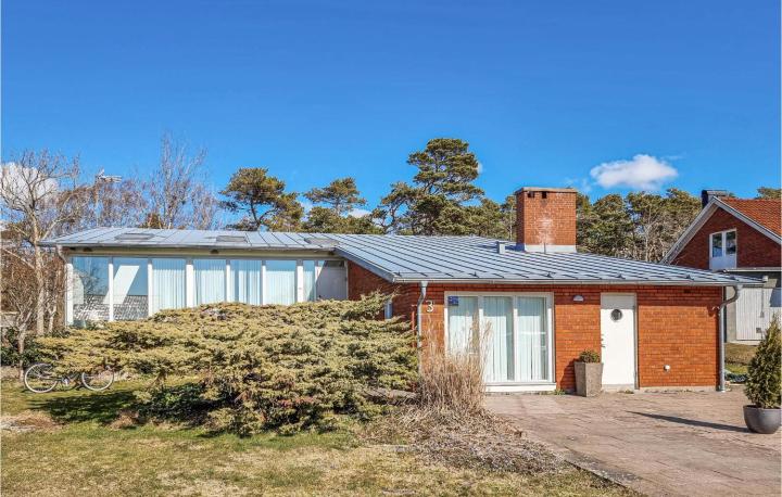 Amazing home in Trslvslge with Sauna, WiFi and 4 Bedrooms