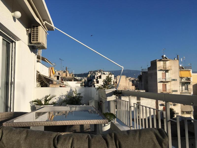 Sunkissed Rooftop Apartments — отель с удобствами в Афины