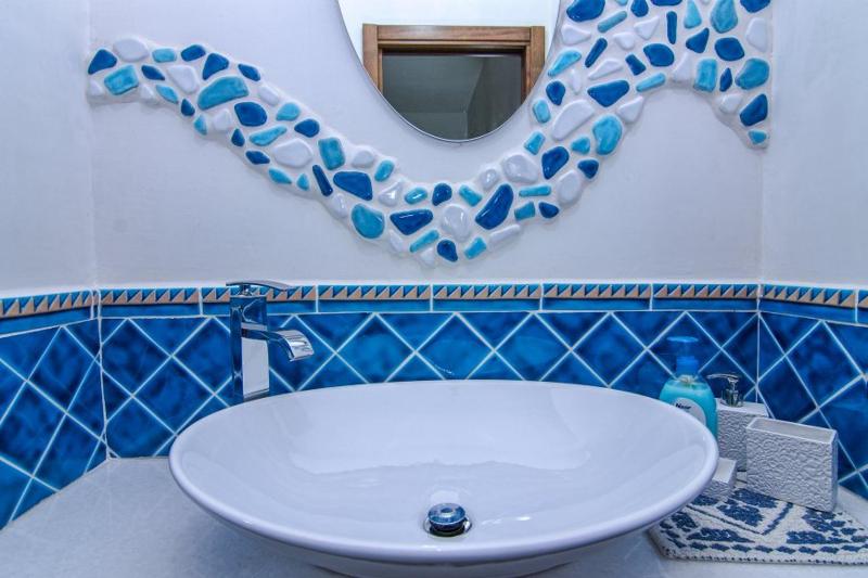Experience Room a Tortolì - Camere Moderne con Giardino