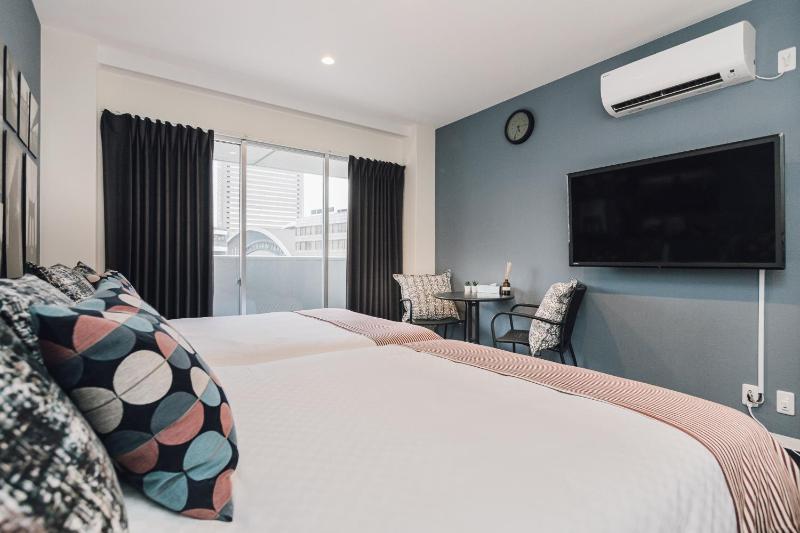 Namba Garden Square Apartment — отель с удобствами в Осаке
