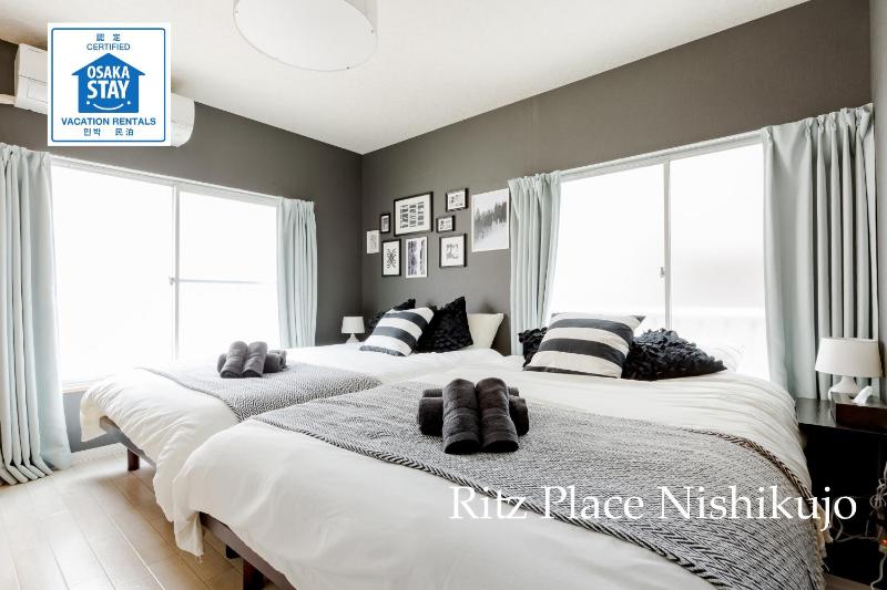 Ritz Place Nishikujo — отель с удобствами в Осаке