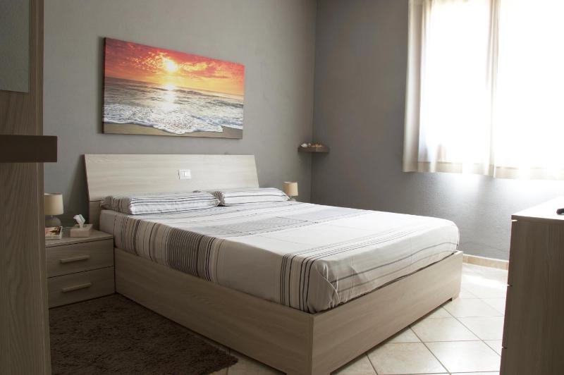 Condominio Le Palme: Spazioso comfort con piscina