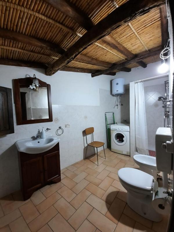 Domo Sedda a Galtellì - Rustica casa vacanze con giardino