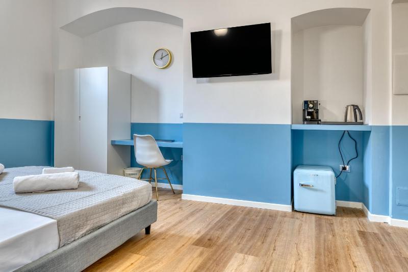 IzzHome Corso76 a Cagliari - Camere familiari centrali