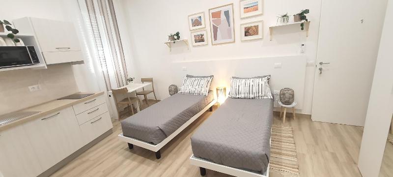 SUITE BLANC a Guspini - Eleganti monolocali centrali