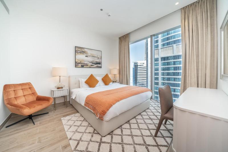Luton Vacation Homes - Luxury & High floor 2BR , Jumeirah Living Marina Gate 3 - 48AB07 — отель с удобствами в Дубае