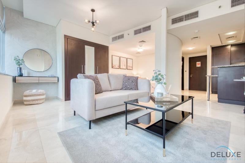 Special Rate Cozy Studio with Balcony Near Attractions by Deluxe Holiday Homes — отель с удобным расположением в Дубае