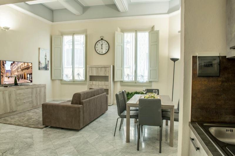 Mamo Florence - Cavour Rosa Apartment — отель с удобствами в Флоренции