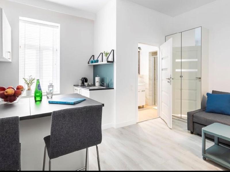 Wspolna 54 - Blue - Good Apartments — отель с удобствами в Варшаве