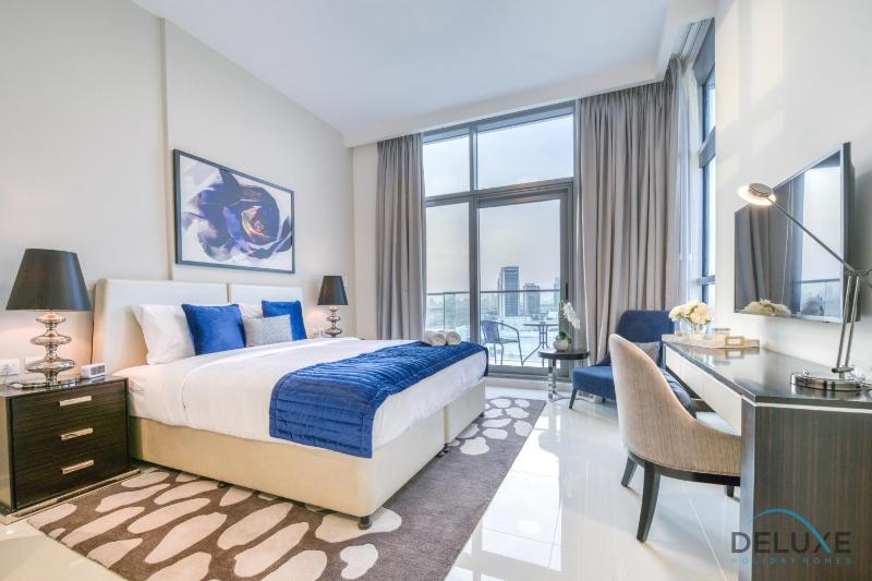 Sunlit Studio at Golf Promenade 2A DAMAC Hills By Deluxe Holiday Homes — отель в Дубае, Объединенные Арабские Эмираты
