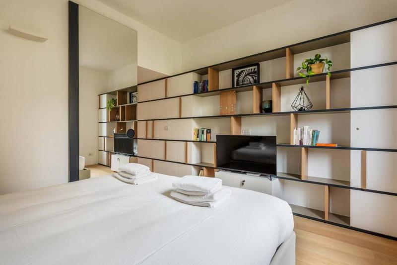 Stupendo bilocale di design appena ristrutturato a 15 minuti dal Duomo by Easylife — отель с удобствами в Милане