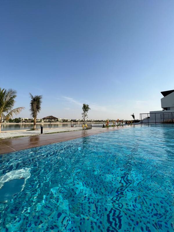 Relaxing villa with access to pool and beach — отель с удобствами в Рас аль-Хайме