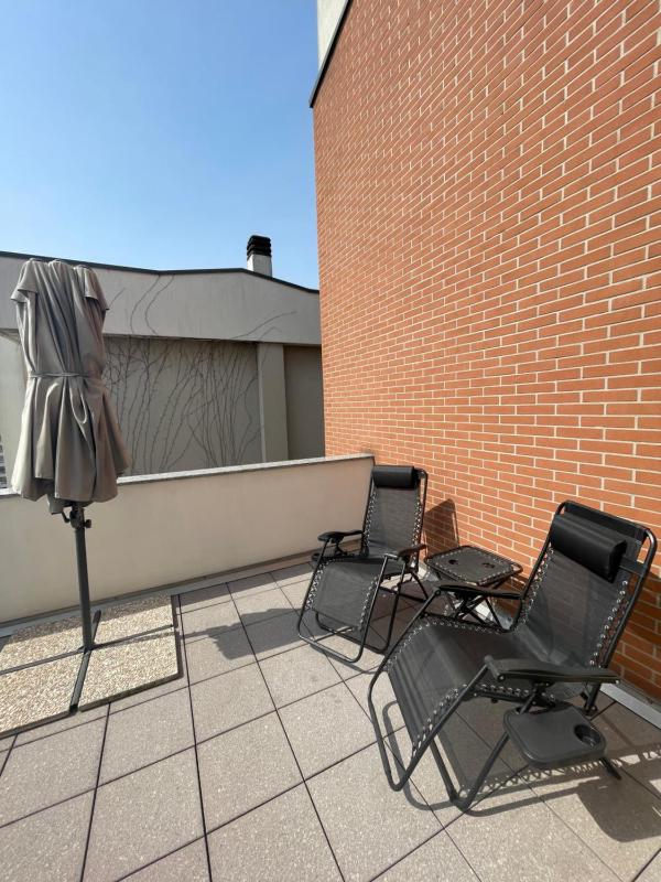 Elegant Apartment in Milan with Panoramic Terrace — забронировать отель в Милане