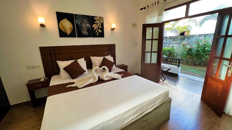 Room in BB - Sea Pink Residence Bentota — отель в Бентота, Шри-Ланка