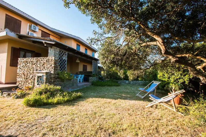 Casa Vacanze a Stintino - Incantevole Giardino sul Mare