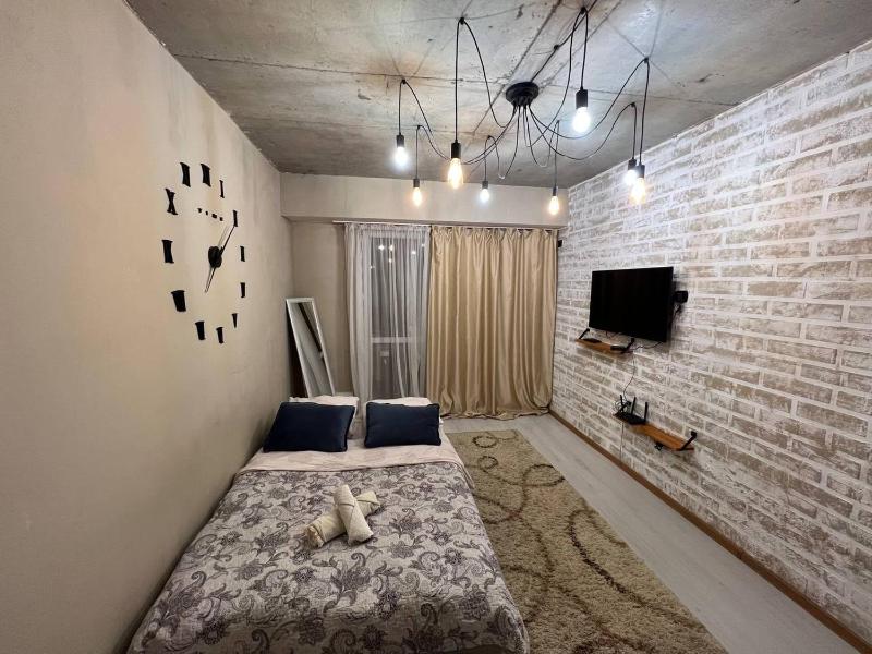 Kvartira v stile loft v 15 minutah ot aeroporta — отель с удобствами в Алматы