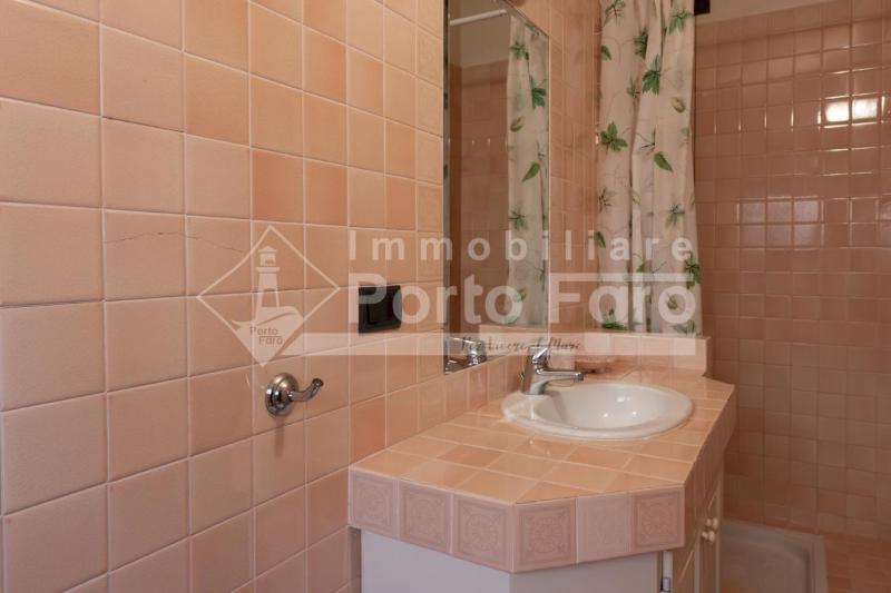 Elegante Trilocale con Terrazza Vista Mare a Palau