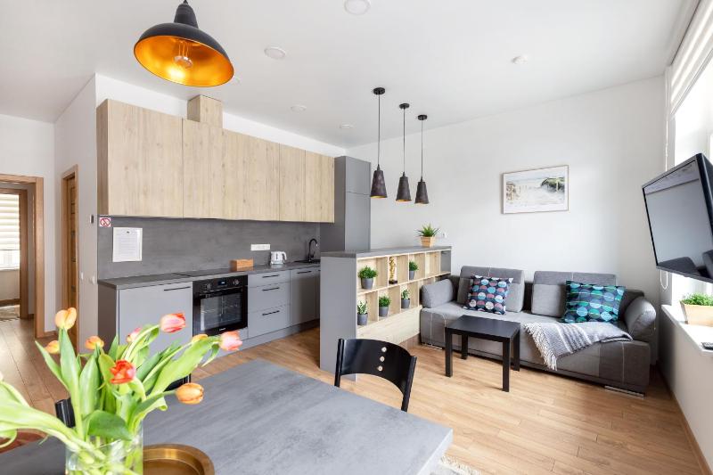 Cosy Apartments by Reside Baltic — отель с удобствами в Вильнюсе