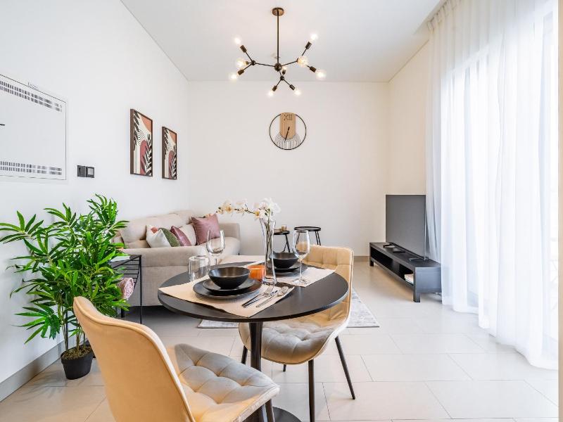 Cozy 1 Br - Burj Khalifa Glimpse - Sobha Hartland — отель с удобствами в Дубае