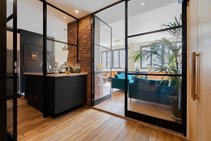 Loft spacieux de 150m2 au centre de Paris — отель с удобствами в Париже