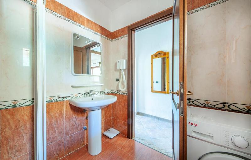 Trilo 6 giardino a Golfo Aranci - Confortevole trilocale