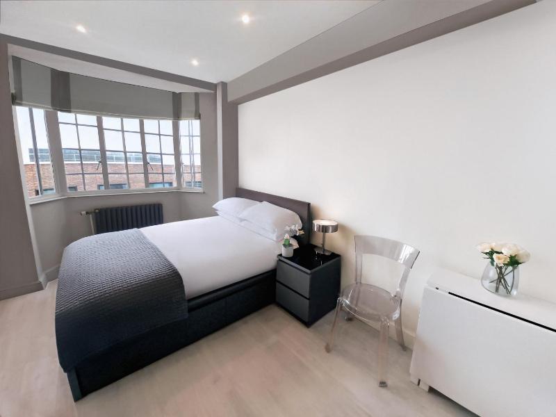 Chelsea Flat 10 mins Harrods, Gym, Air Conditioning — отель с удобствами в Лондоне