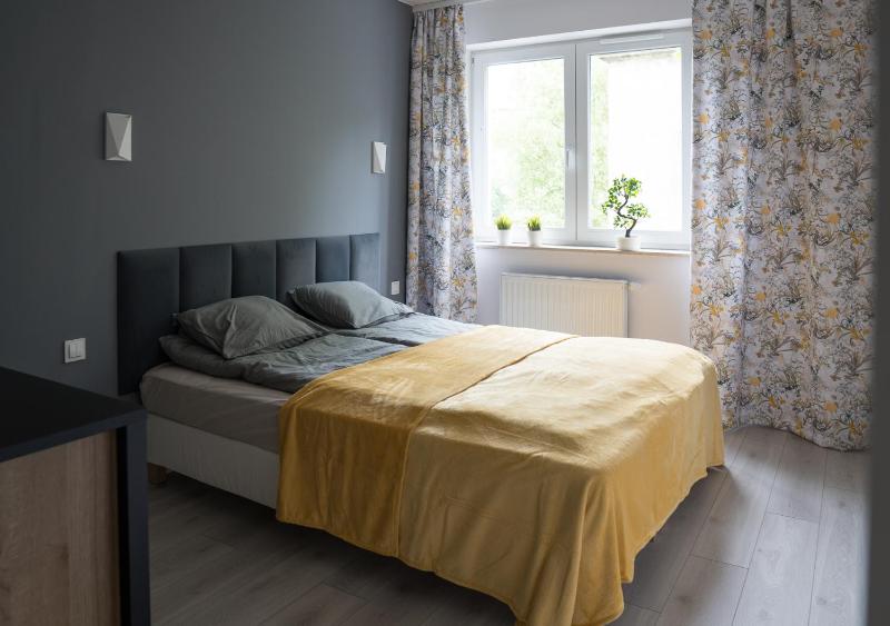 Apartament Wiosenny Kamienica Grochow with free parking — отель с удобствами в Варшаве