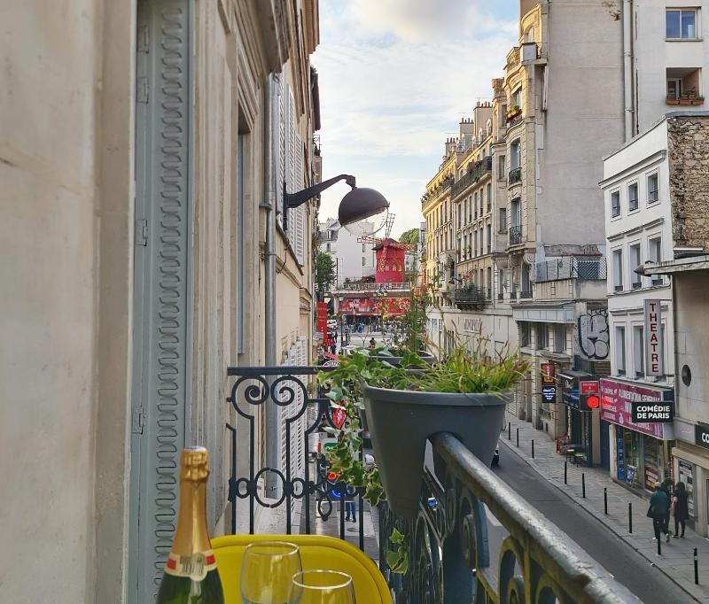 Paris 9 - Appartement Haussmannien au Moulin Rouge — отель с удобствами в Париже